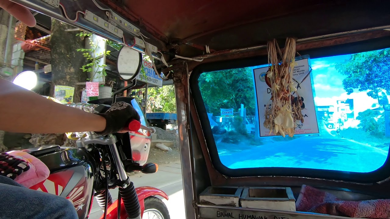 Philippines, tricycle ride from Dela Costa Homes III to SM City San Jose Del Monte
