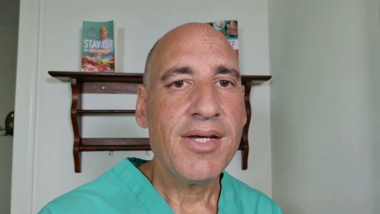 Dr. Philip Ovadia, in scrubs, speaking to camera.