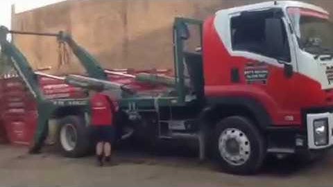 Driver Danny loading skip bins - in fast forward