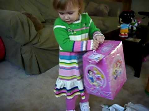 Gloria opening her present from Grandma Kathleen