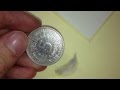 Nettoyage de pices de monnaie avec cristallina