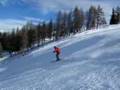 Kira's doing his best trying to look cool on skis