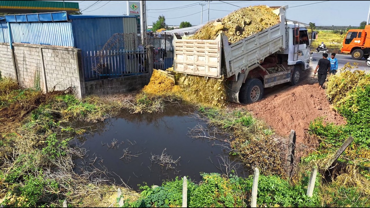 Be Carefully Started New Project! Dumptruck Loading Soil Flood Area,By Bulldozers D21 Pushing Soil 