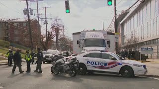 3 officers shot, another hurt after serving an arrest warrant in Washington D.C.