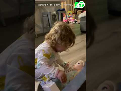 'Oh goodness': Toddler has adorable reactions while opening Christmas presents