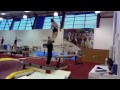 Catalina ponor practicing a double layout dismount on beam