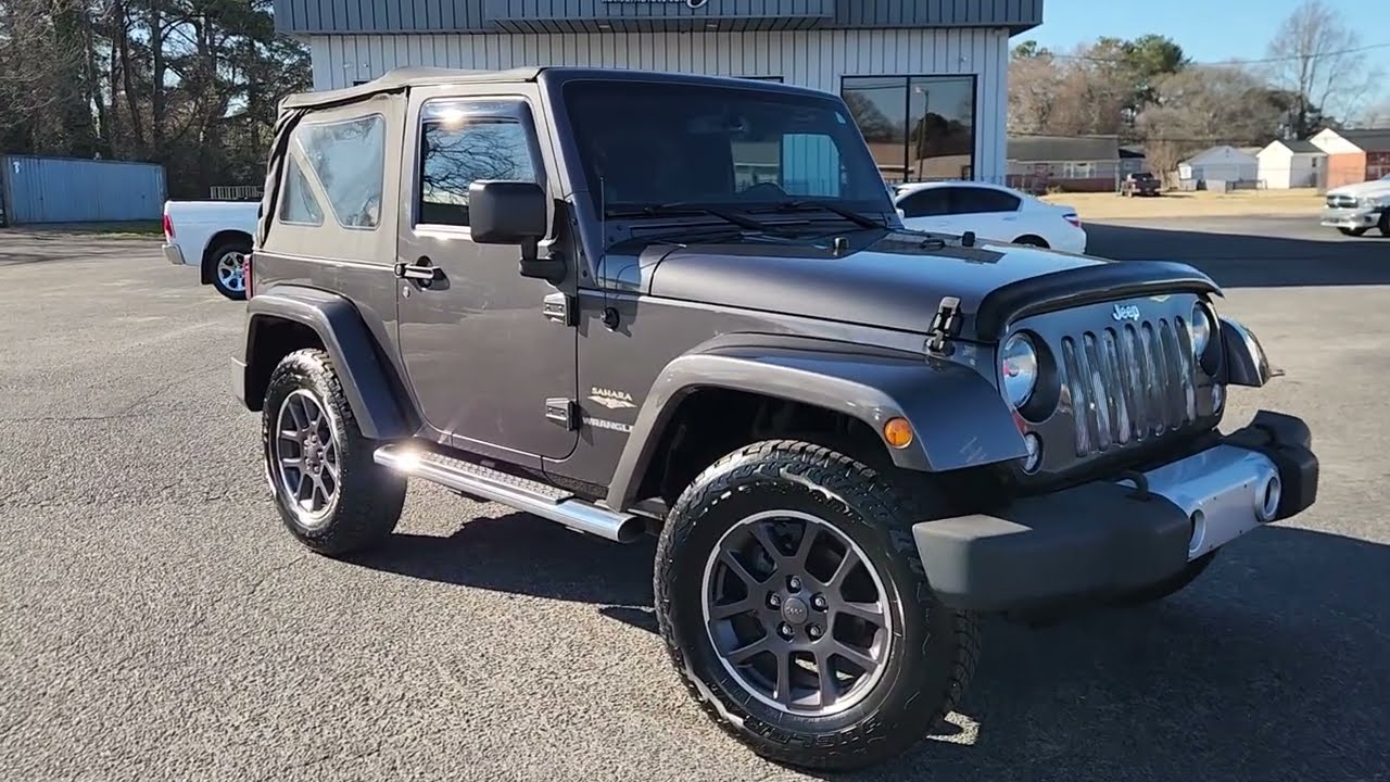 2014 Jeep Wrangler Sarara 2 Dr 6-Speed Manual Transmission 52k Low Miles for sale at Holiday Motors