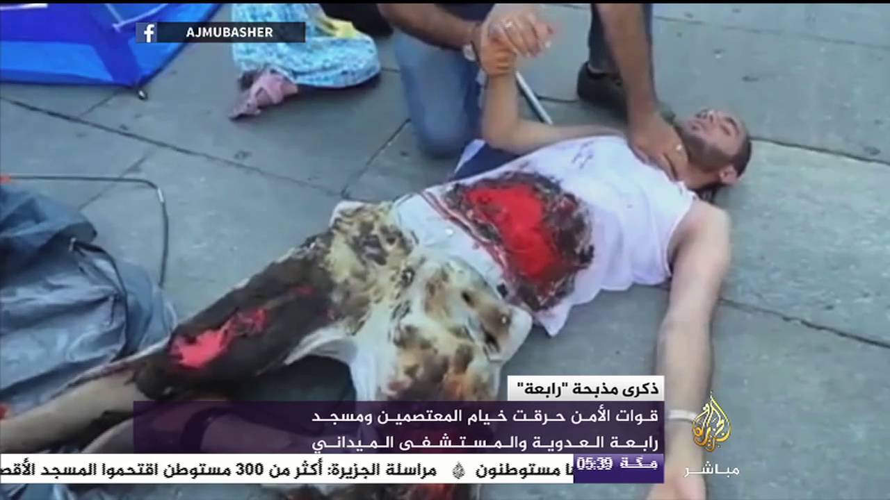 مشاهد تحاكي مذبحة فض اعتصام رابعة ضمن فعاليات رافضي الانقلاب في مدينة "تورينو الإيطالية"