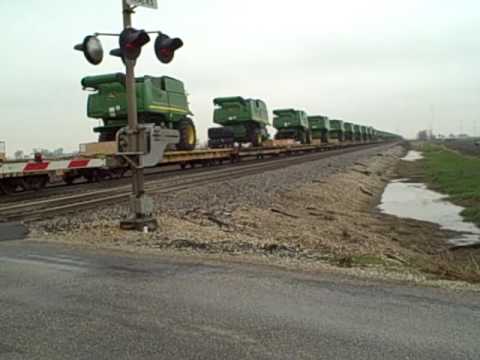 BNSF 5046 East With a John Deere Train