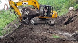 JCB Excavator VS Big StonesExcavator Widening Hilly Road