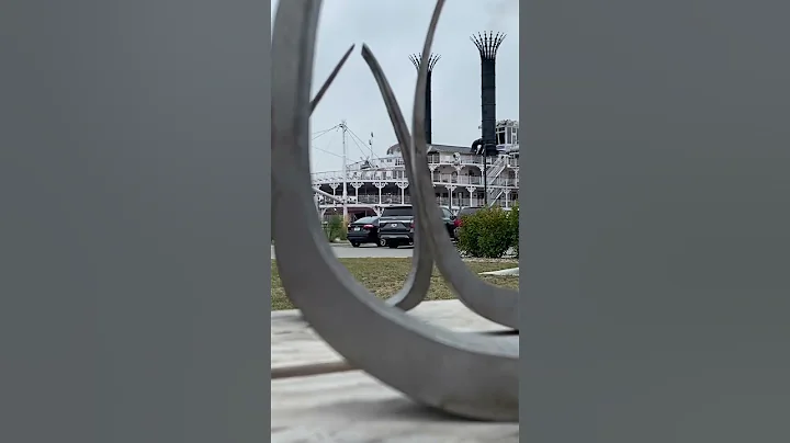 Doris Chase sculptures in front of the American Qu...