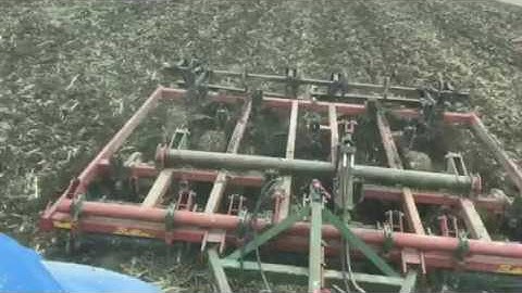 New holland t8.275 tractor pulling an 11 shank Chisel plow in corn ground in central Wisconsin.