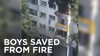 Brothers Dropped 30 Feet To Safety During Fire: Video