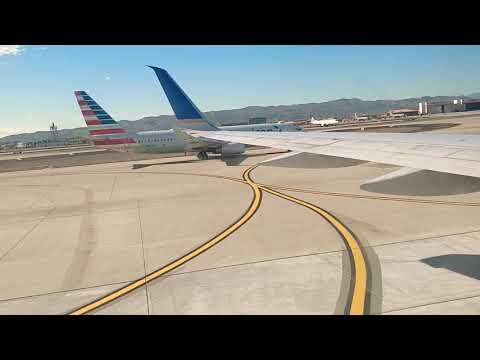 United overtaking American on the runway at Phoenix