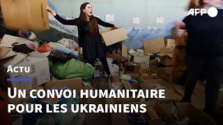 A Besançon, mobilisation autour d'un convoi humanitaire pour aider les Ukrainiens | AFP