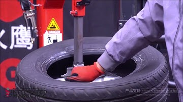 How to operate a tyre changer with helper arm