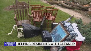 Residents get help with cleanup after Woodridge tornado