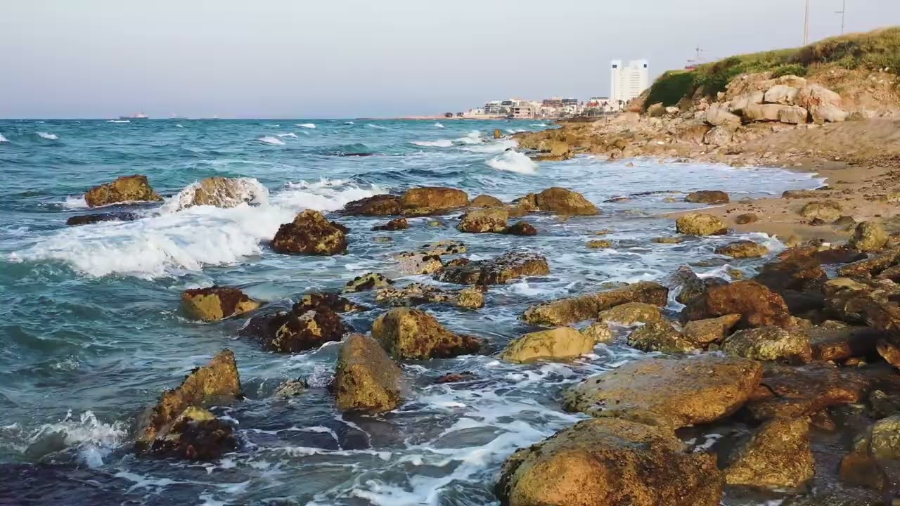 Strong Sea Waves Crashing The Rocky Shoreline
