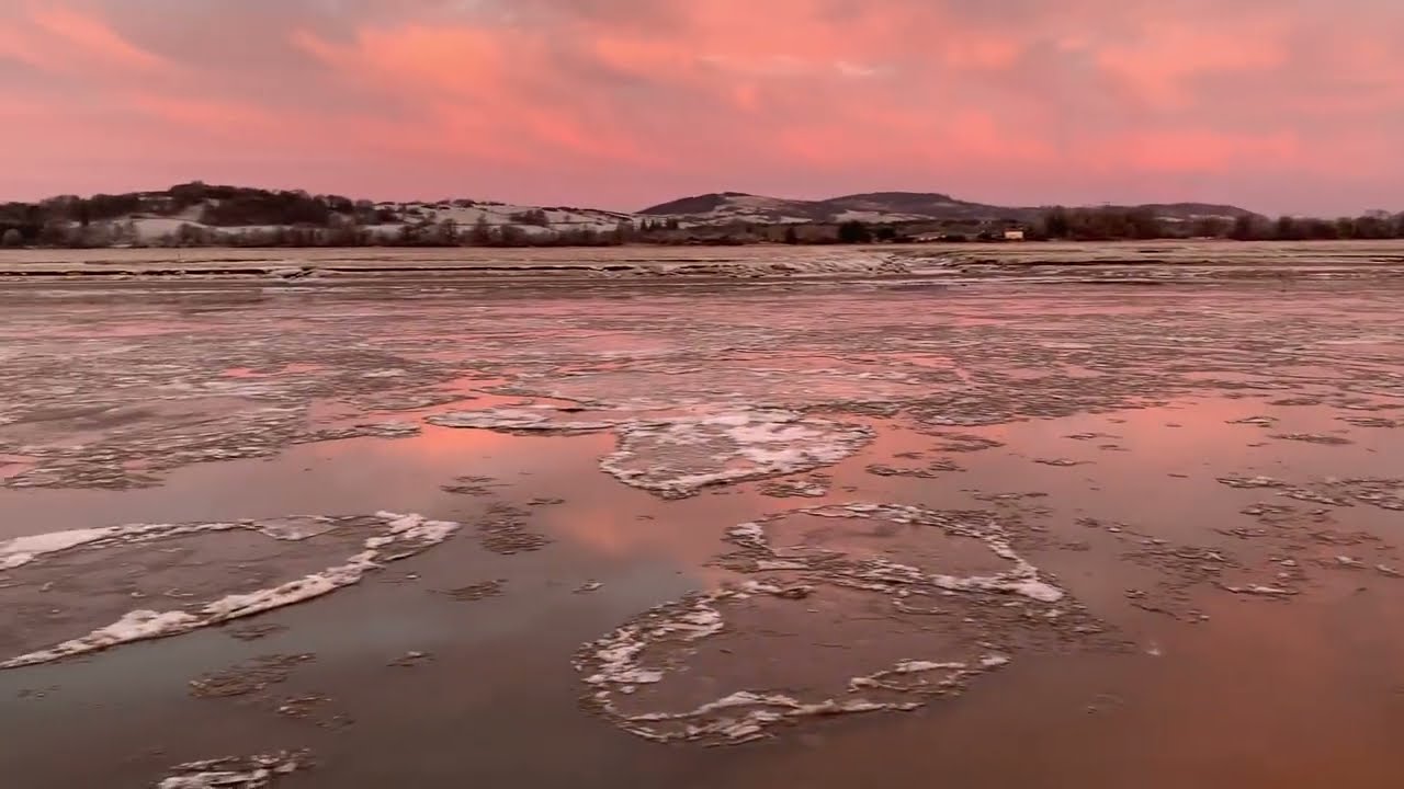 Sunrise and ice sheets floating up steam after the Nith Tidal Bore Glencaple 11.01.25