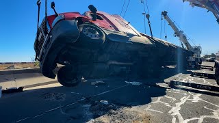 Container rollover in tight spot  rotators get it back up in 25min!