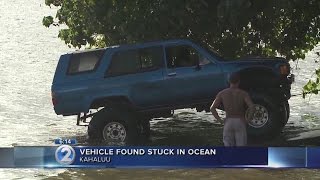 SUV stuck in shallow waters off Windward Oahu