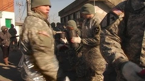 AFN Casey - AFN Korea Update - 1ABCT Soldiers deliver coal to Korean families