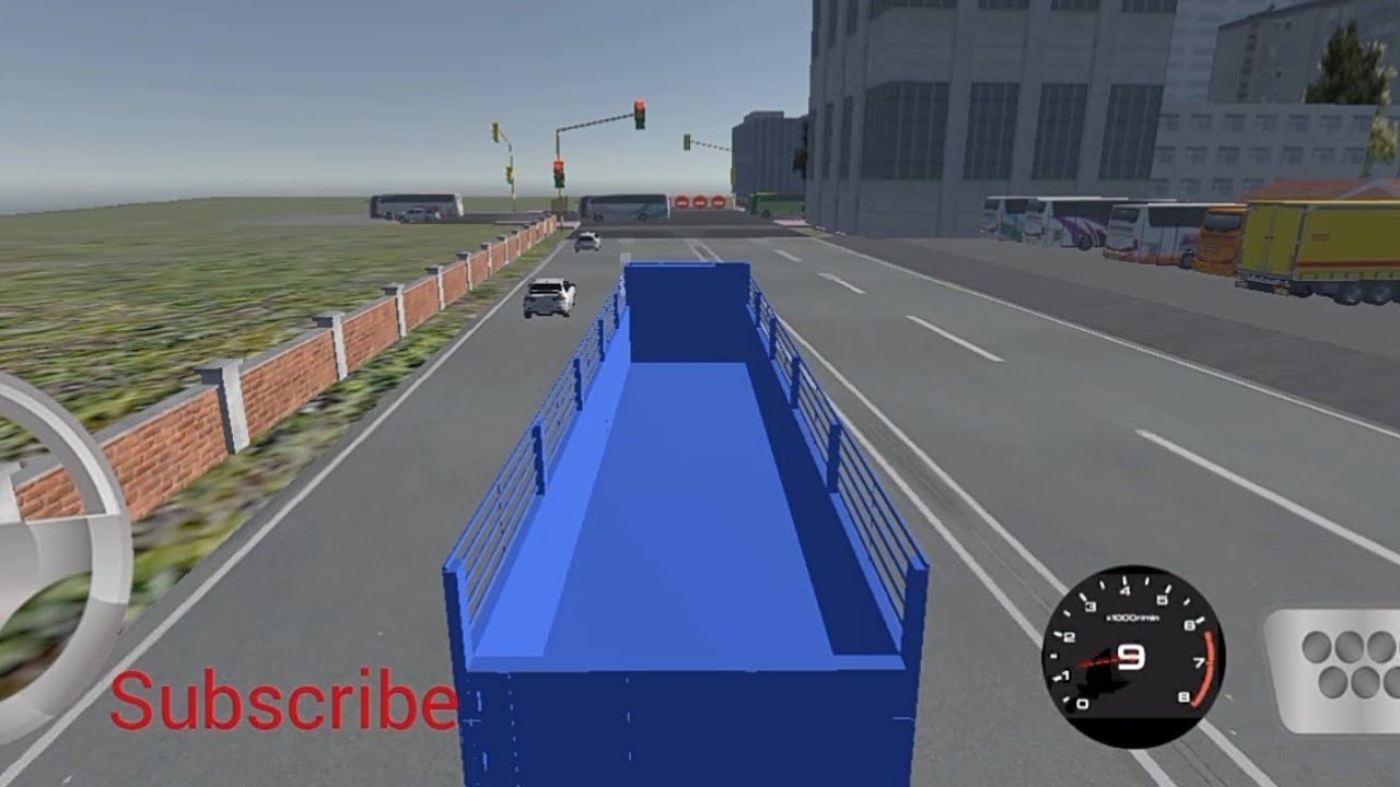 Truk simulator truk tronton meluncur kencang melewati jalan raya yang mulus