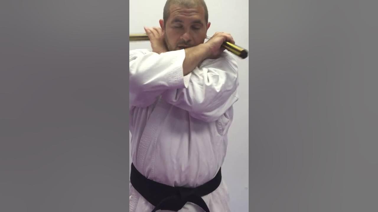 How to Use Nunchucks for beginners Behind the Neck Nunchuck Drill by