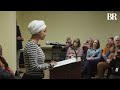 MOMENT: Security tackles heckler who approached Ilhan Omar, threw liquid at town hall
