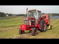 IH 1086 baling w/ NH 648 round baler (part 1)