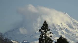 Timelapse Captures Frosty Clouds Swirling Over Mount Rainier