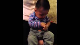 Baby Cliff Eating Clementines