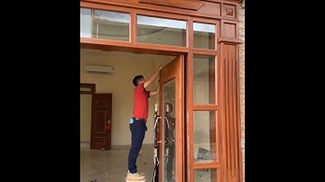 Cửa thép vân gỗ Koffmann - Thi công cửa Luxury thủy lực KLT