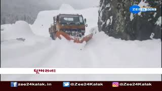 Snowfall : The process of clearing snow underway after fall | Children playing cricket