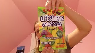 Mena Taste Testing Life Saver Sour Gummy Candy