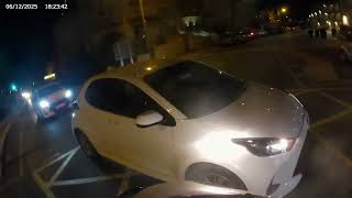 Moron at a roundabout