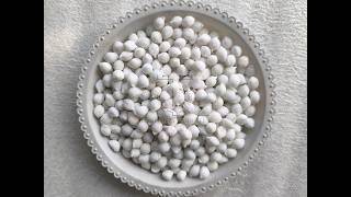 Double roller extrusion granulator for granulating industrial salt powder materials