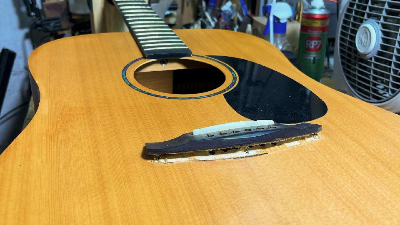 How to Re-glue an Acoustic Guitar Bridge | Fixing a Detached Bridge