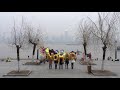 Golden balloons in Wuhan, China - Nomad at Hankou River Beach