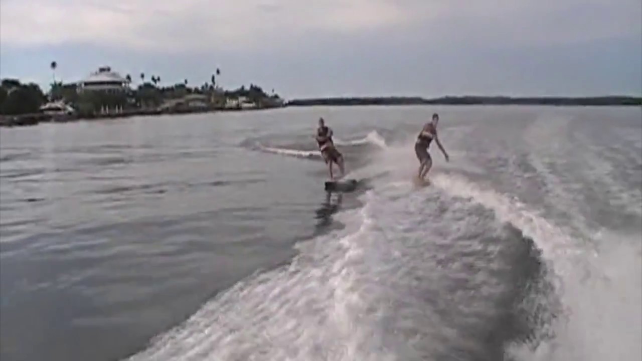 SKIMBOARDING WAKEBOARDING AND TUBING behind the boat with friends (2008