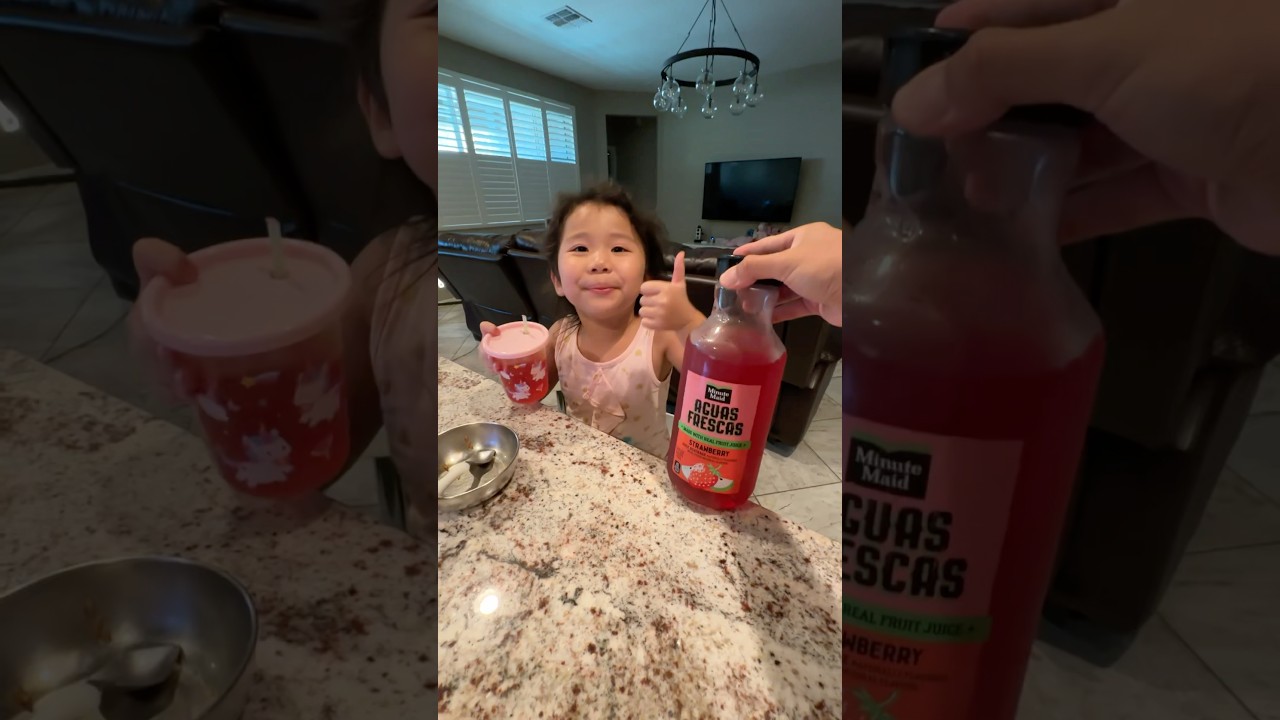 Yummy! Chloe enjoys drinking Minute Maid Aguas Frescas Strawberry juice