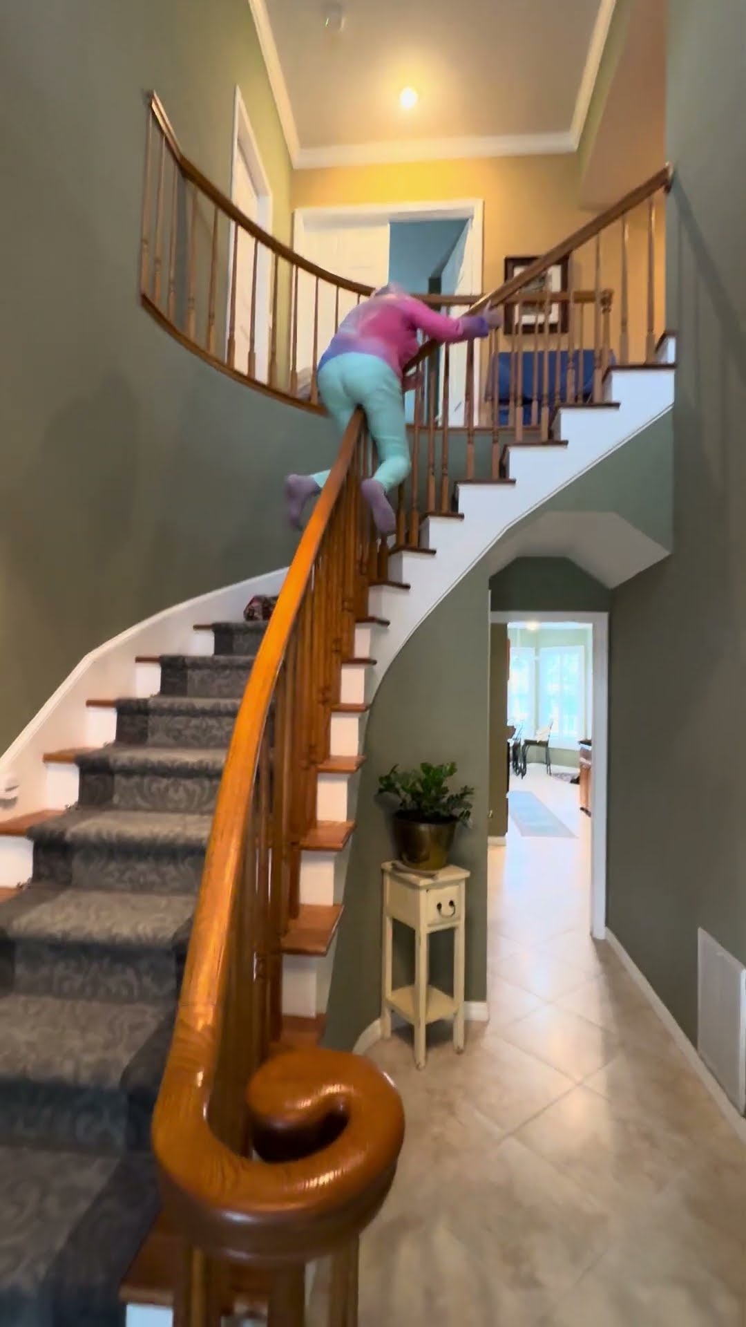 Playful Nan Slides Backward Down Banister || ViralHog