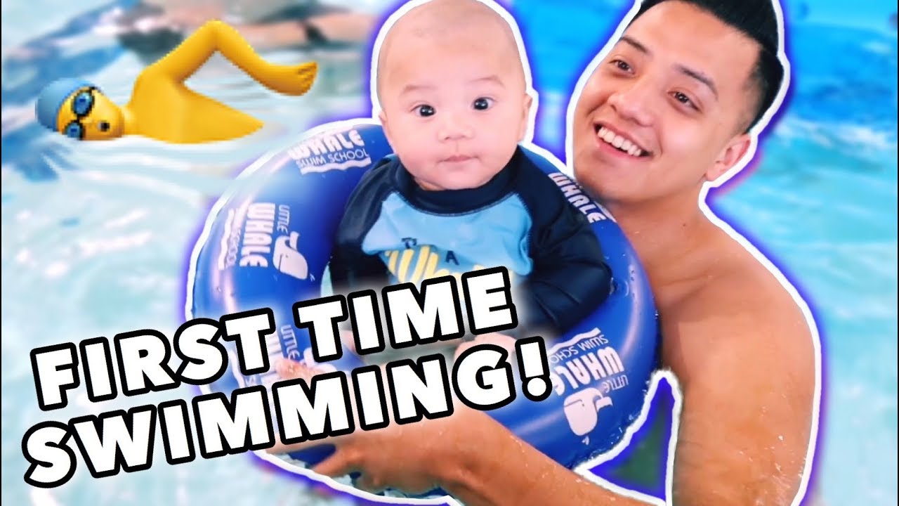 BABYS FIRST TIME SWIMMING! - YouTube