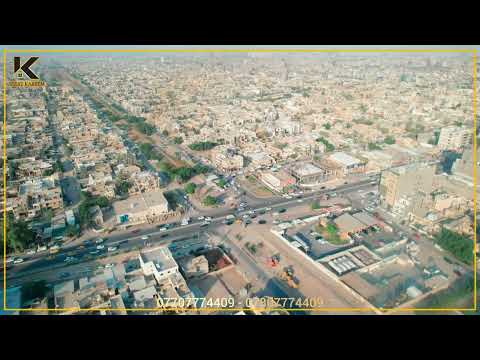 قطعة ارض تجارية في بغداد منطقة اليرموك مقابل محطة وقود اليرموك قرب نفق الشرطة