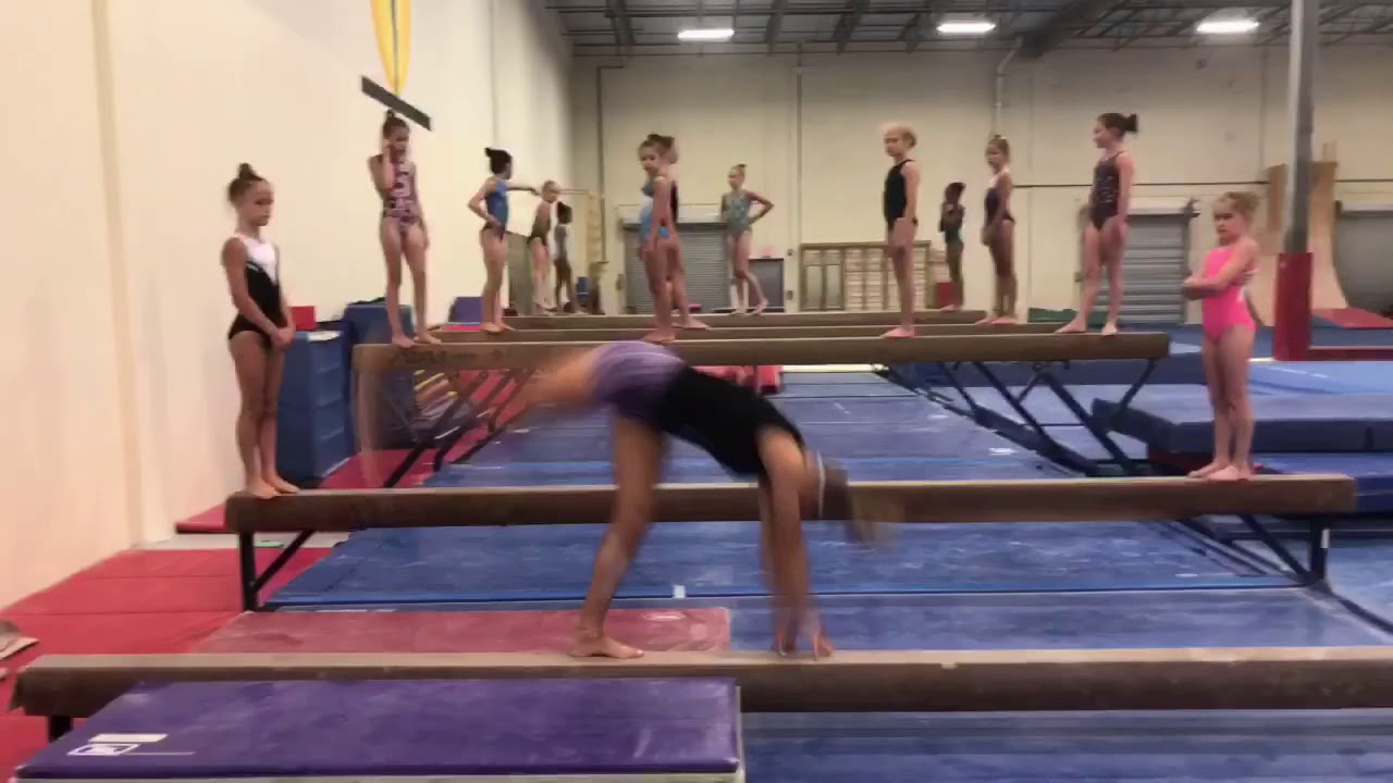 Jacklyn Dolitsky- handspring handspring layout on low beam - YouTube
