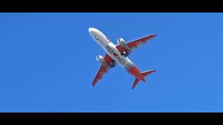 SSJ-100 Red wings Екатеринбург-Омск садится днём над центром Омска.