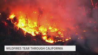 California wildfires rage on, Northeast US swelters under heat wave