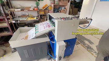 Automatic paper embossing machine