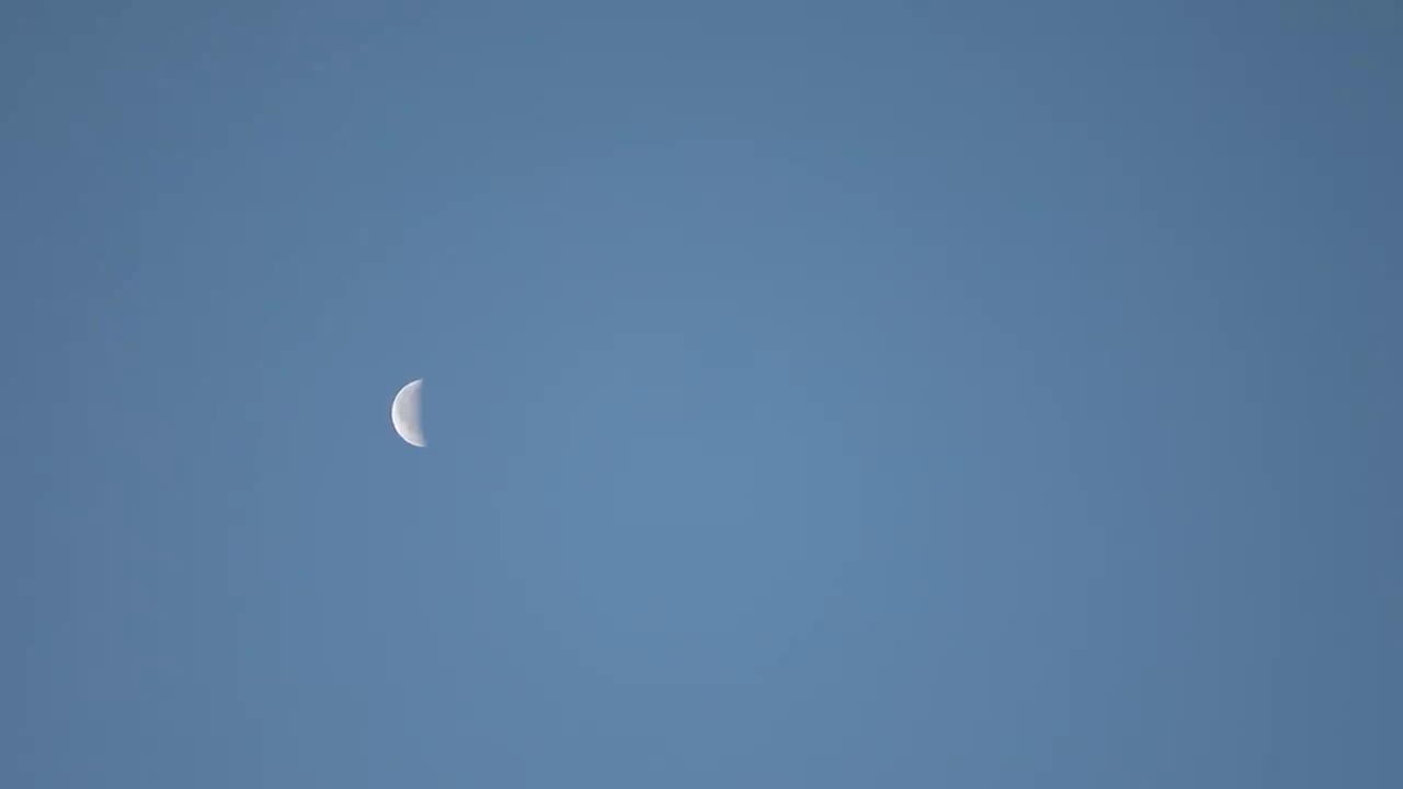 Dollar Stock Video | Moon during Sunrise Rack Focus | 59.94fps HD 1080p