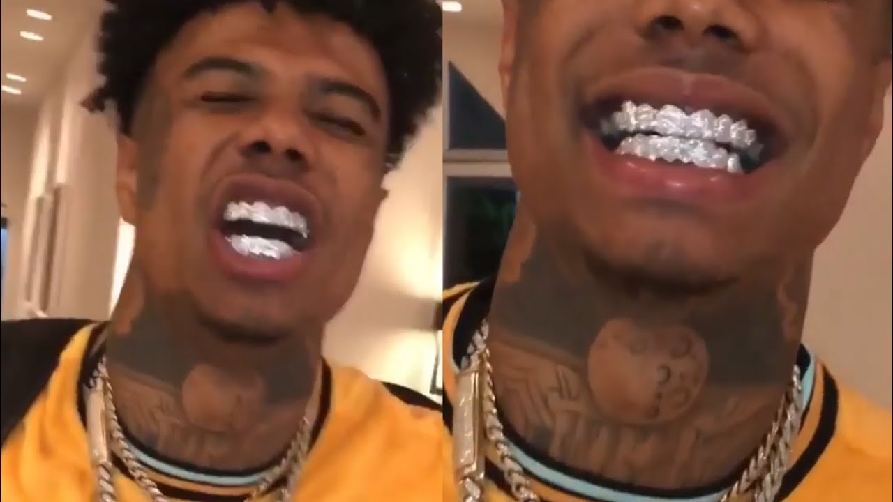 Blueface Flexes With His Diamond Grillz